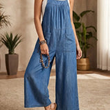 Solmira | Lahtine denim üleõlgadega jumpsuit