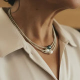 Looduslike pärlite kaelakee" could be rewritten as "Natural Pearl Necklace.