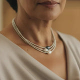Looduslike pärlite kaelakee" could be rewritten as "Natural Pearl Necklace.